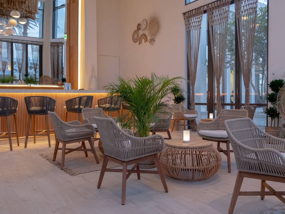 Chic and comfortable seating at Cabana 9, Saadiyat Beach Club’s elegant poolside bar and lounge area.