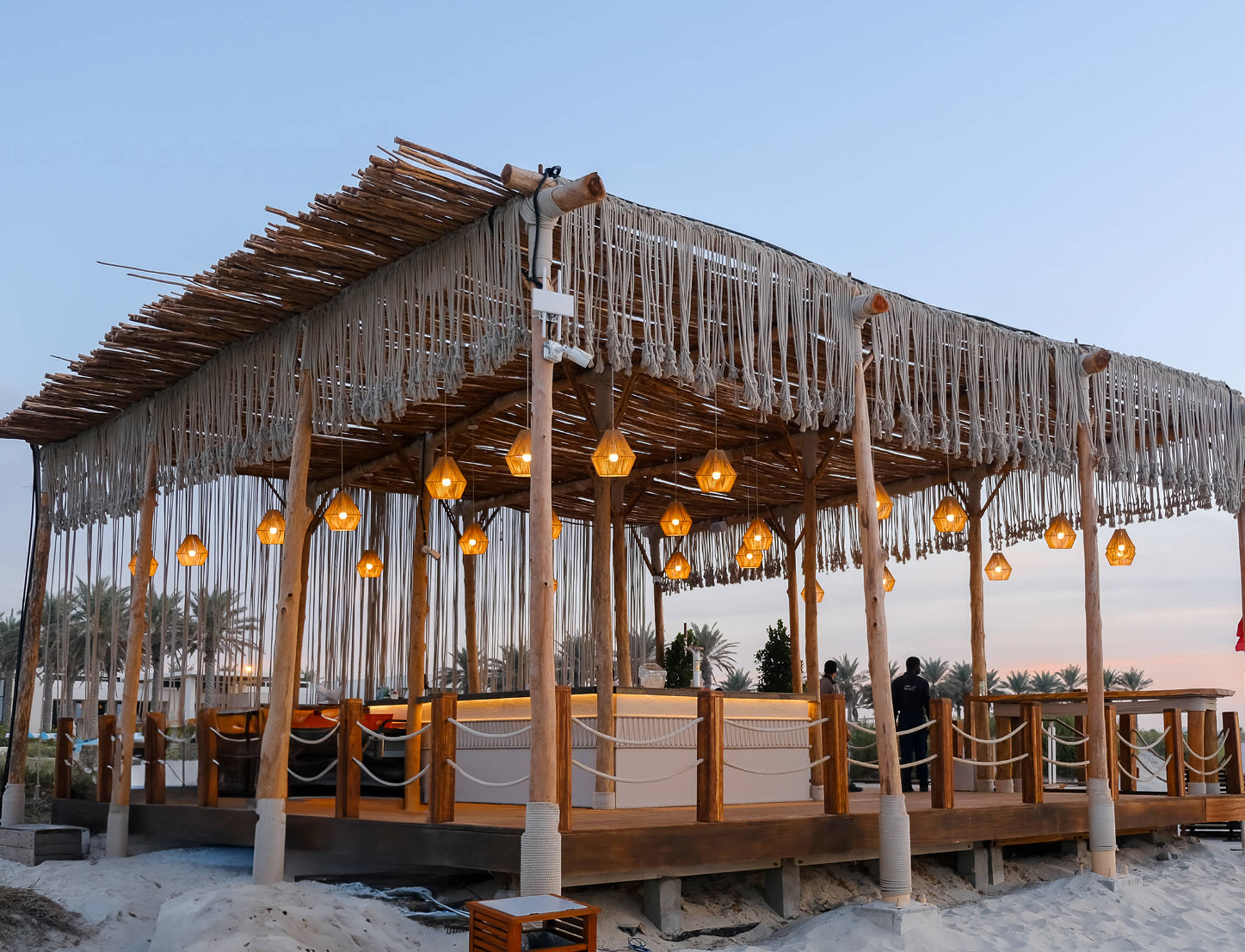 The Beach Bar at Saadiyat Beach Club in Abu Dahbi at sunset. A cosy location to relax on the beach.