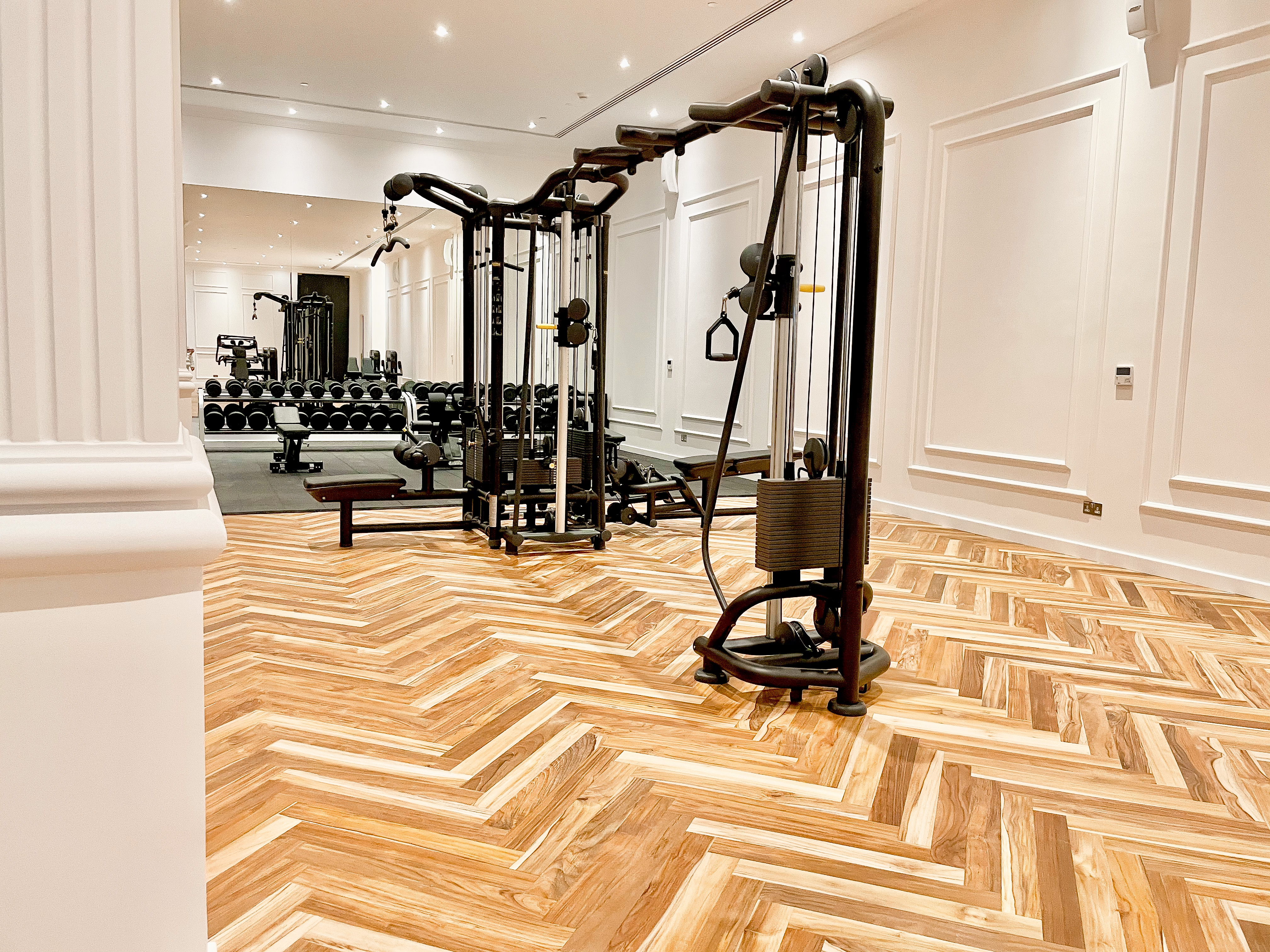 Well-equipped gym at Saadiyat Beach Club, offering a spacious area for fitness enthusiasts to exercise and relax.